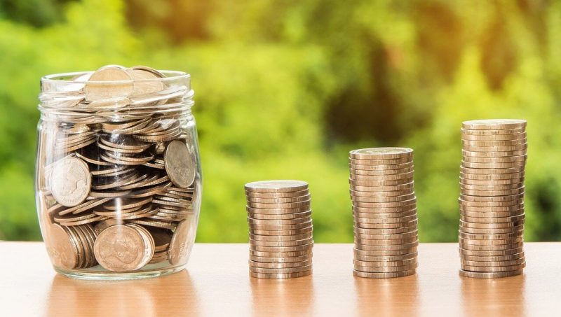 Jar filled with coins